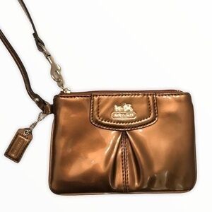 Coach bronze patent leather wristlet clutch bag